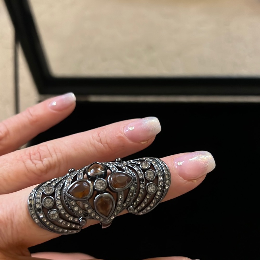 gunmetal and crystal accordion cocktail ring.